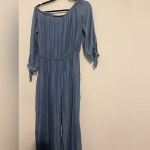 Magnolia Sky Jumper in blue- never worn. While I removed the tags it’s new!